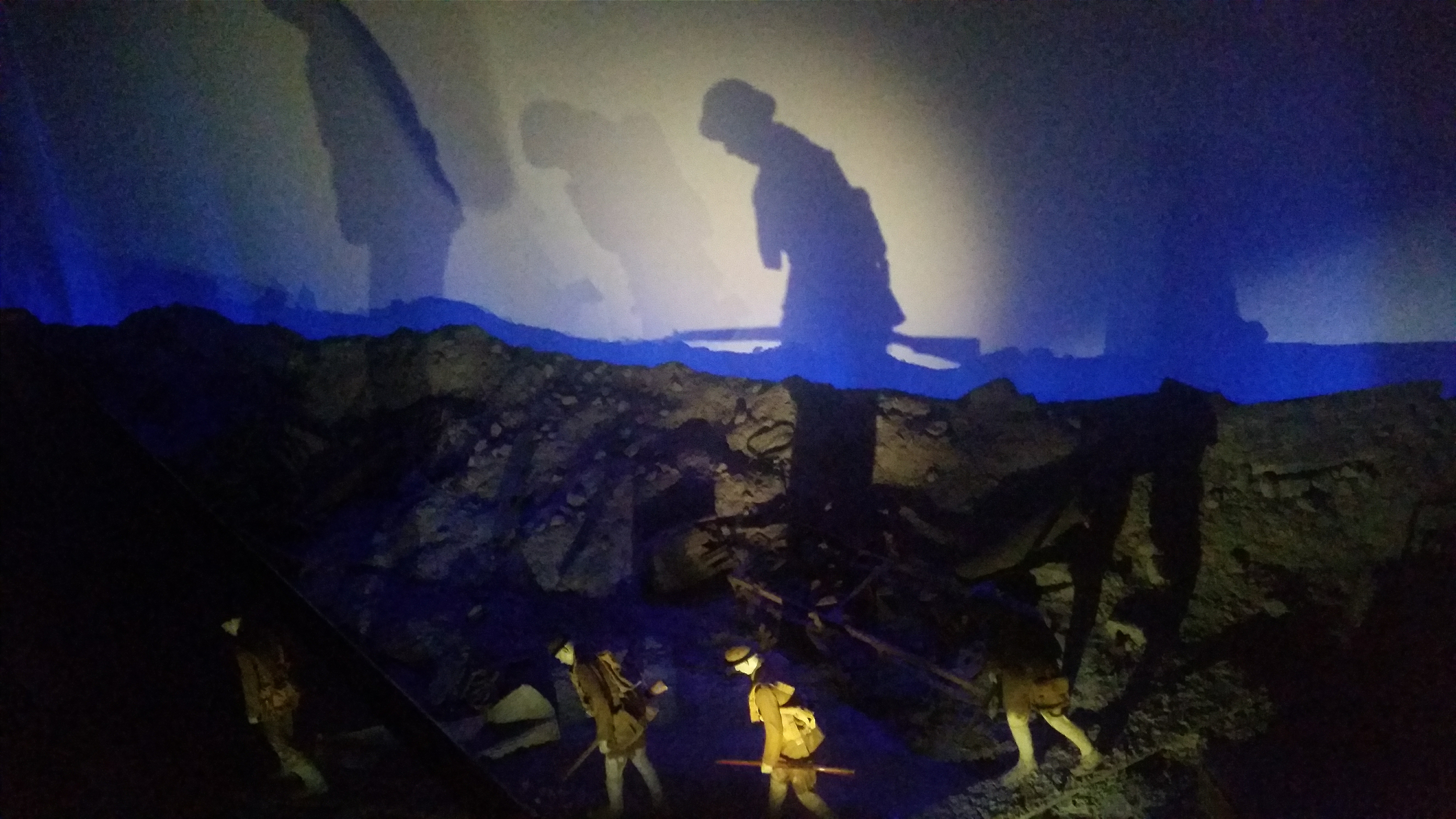 Diorama of men in the hellish trenches.